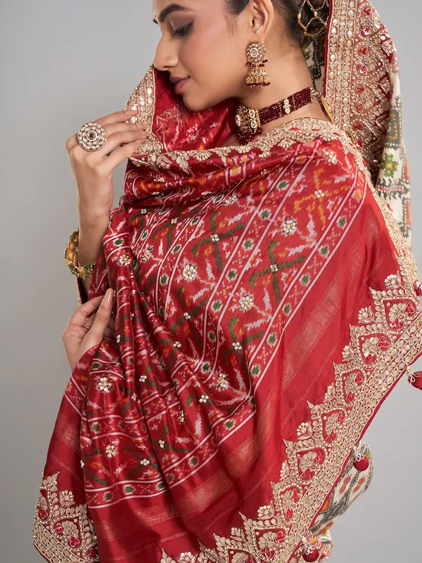 Off-white patola silk saree for wedding elegance
