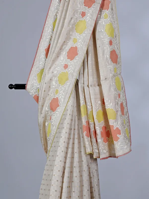 Off white peach semi silk saree with zari and embroidery accents