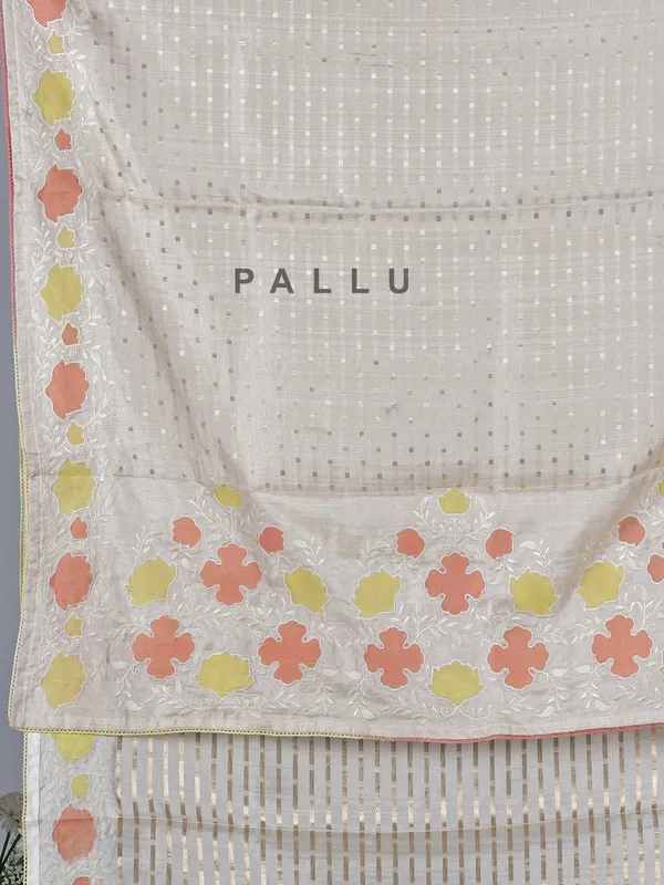 Off white peach semi silk saree with zari and embroidery accents