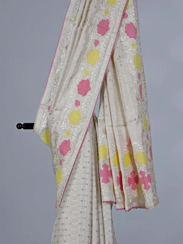 Off white pink semi silk saree with embroidery accents
