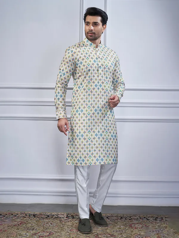 Off white printed cotton kurta suit for festive wear