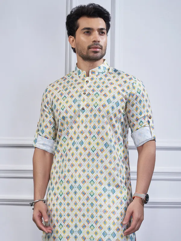 Off white printed cotton kurta suit for festive wear