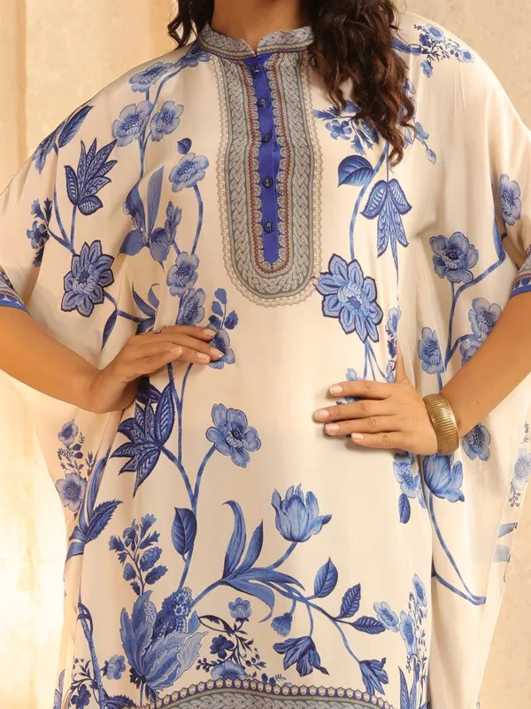 Off white printed crepe silk ponchos top for casuals