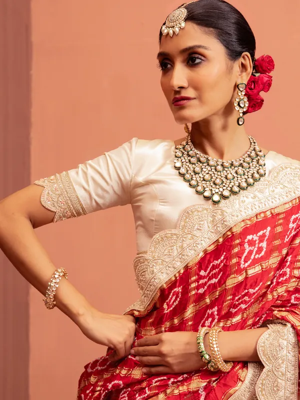 Off white raw silk lehenga choli with embellishments