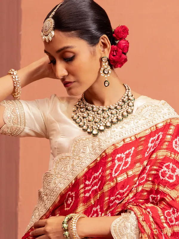 Off white raw silk lehenga choli with embellishments