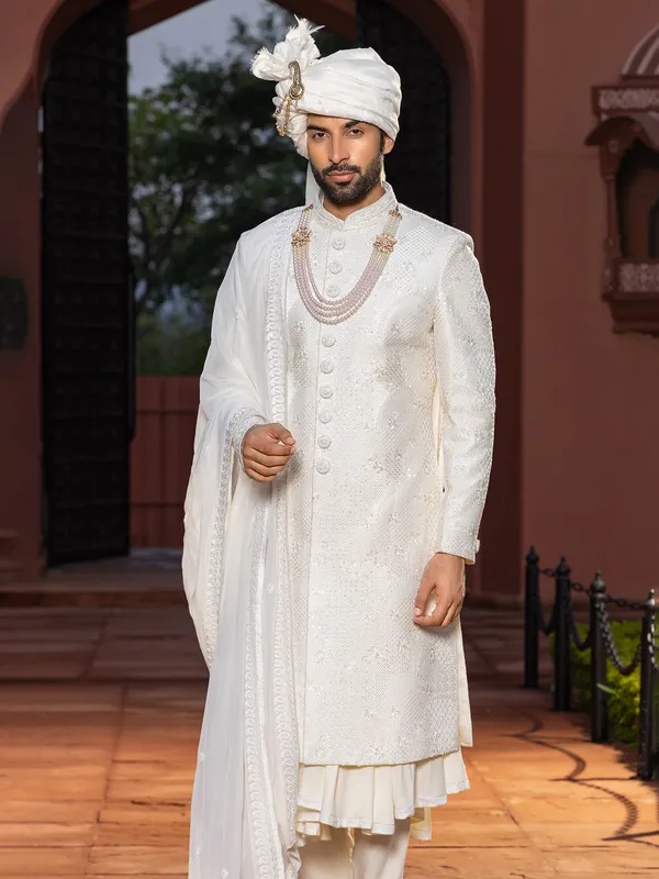 Off white raw silk peshwai style sherwani