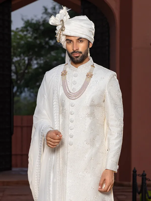 Off white raw silk peshwai style sherwani