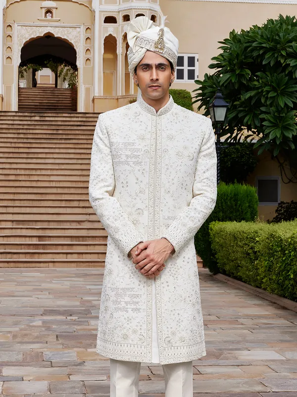 Off white raw silk sherwani for wedding with fine embroidery