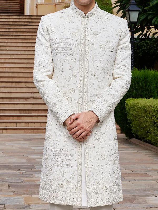 Off white raw silk sherwani for wedding with fine embroidery