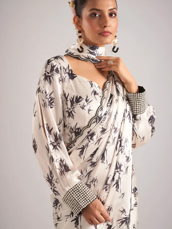 Off white satin saree with cutdana work