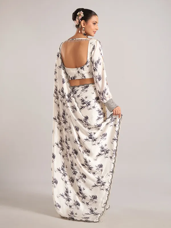 Off white satin saree with cutdana work