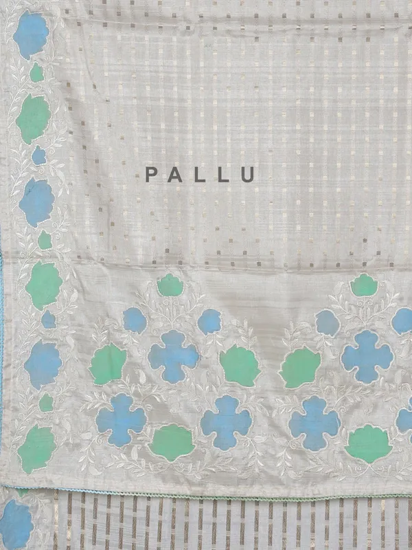 Off white semi silk saree with elegant zari and embroidery work