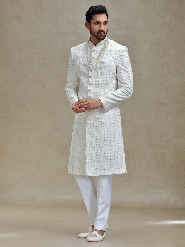 Off white silk fabricated sherwani in embroidery