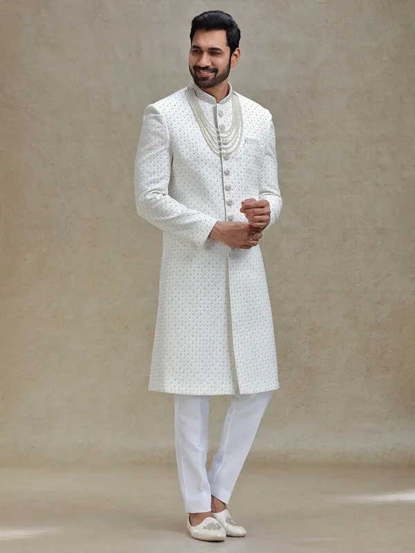 Off white silk fabricated sherwani in embroidery