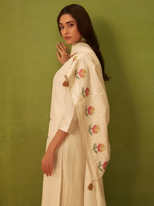 Off white silk kurti with colorful motifs