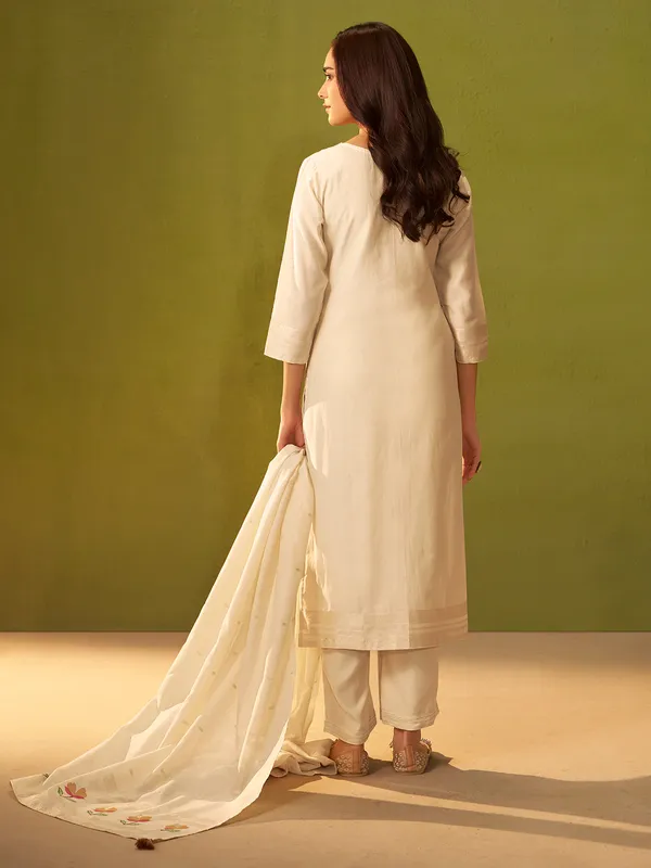 Off white silk kurti with colorful motifs