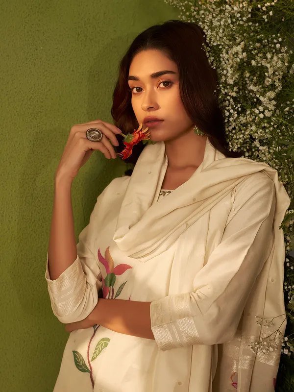 Off white silk kurti with colorful motifs