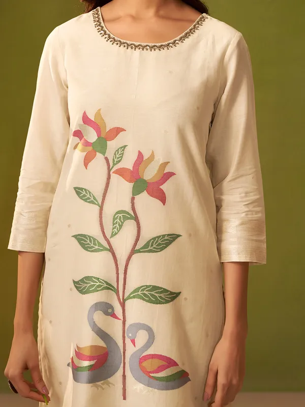 Off white silk kurti with colorful motifs