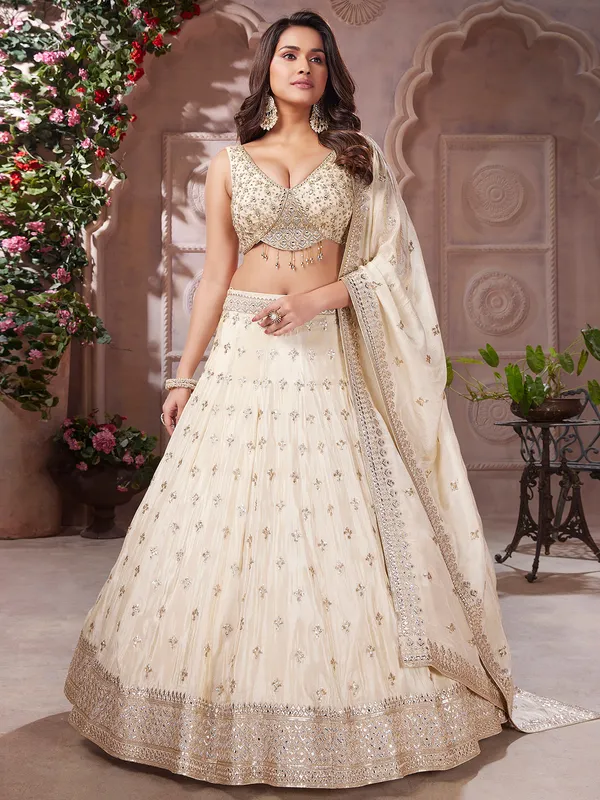 Off white silk lehenga choli for wedding wear