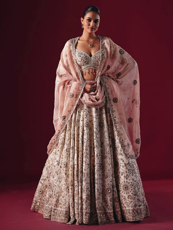 Off white silk lehenga choli with gota and mirror work