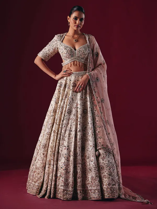 Off white silk lehenga choli with gota and mirror work