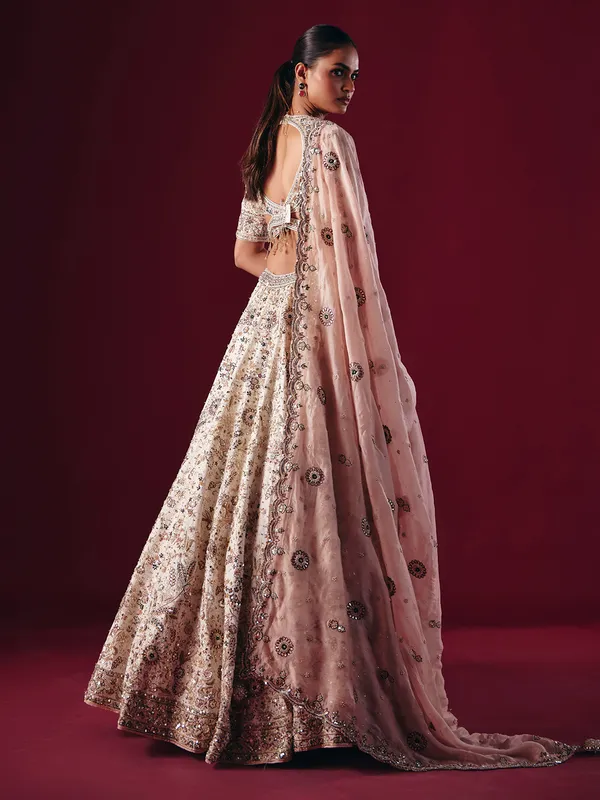Off white silk lehenga choli with gota and mirror work