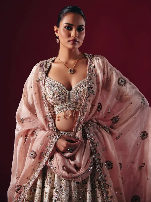 Off white silk lehenga choli with gota and mirror work