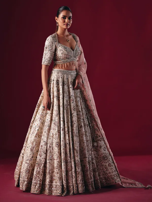 Off white silk lehenga choli with gota and mirror work
