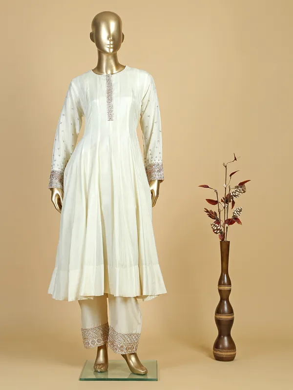 Off white silk palazzo suit with contrast dupatta