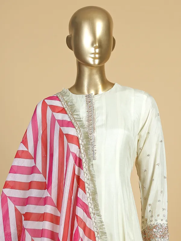 Off white silk palazzo suit with contrast dupatta