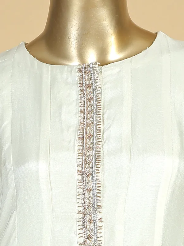 Off white silk palazzo suit with contrast dupatta
