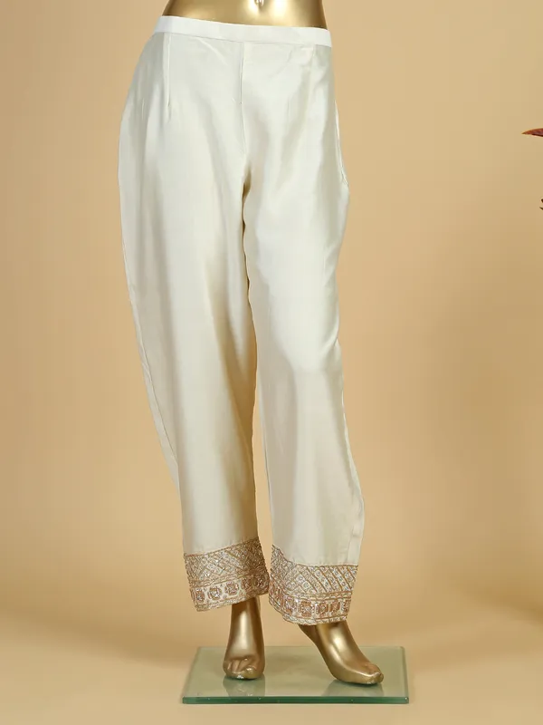 Off white silk palazzo suit with contrast dupatta