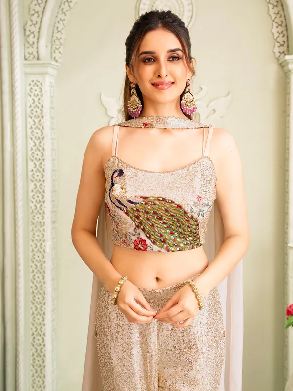 Off white silk palazzo suit with resham and sequins