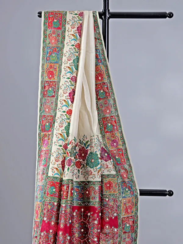 Off white silk saree with beaded detailing