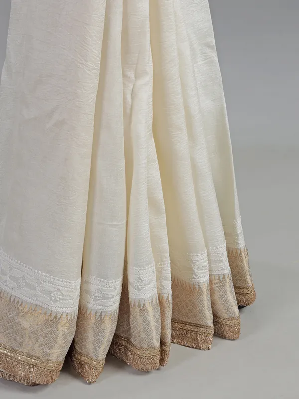 Off white silk saree with resham weaving