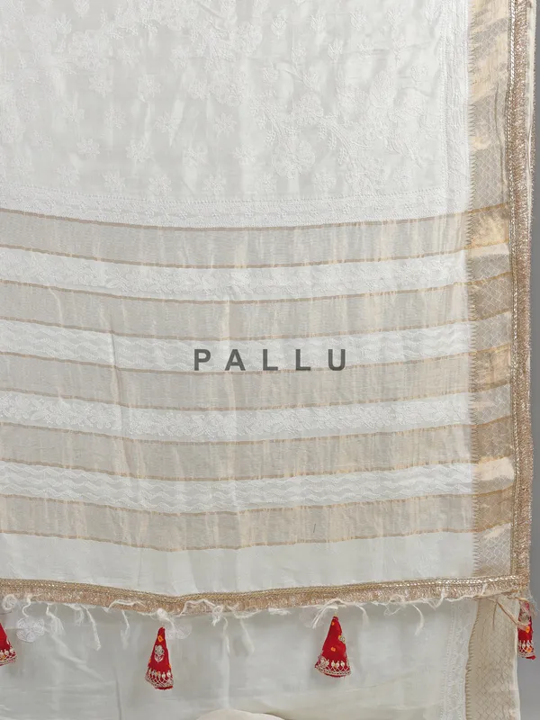 Off white silk saree with resham weaving