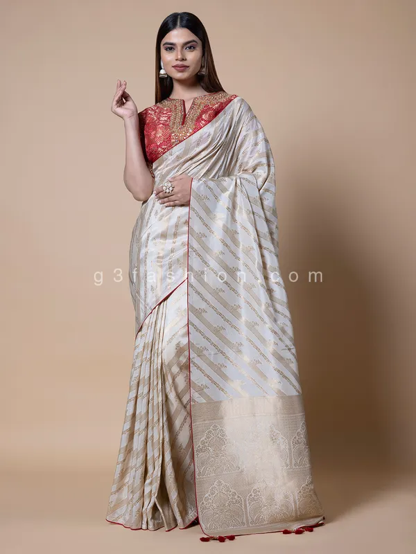 Off white silk saree with zari weaving