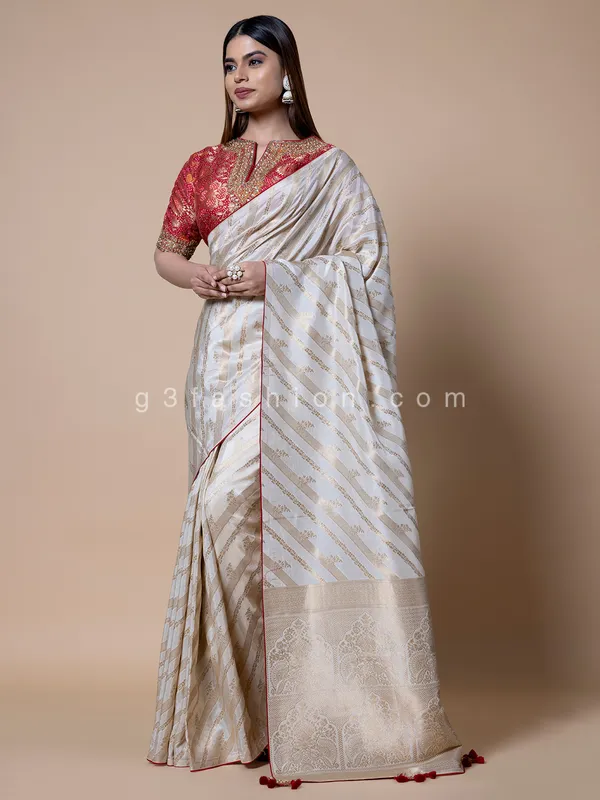 Off white silk saree with zari weaving