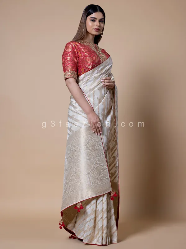 Off white silk saree with zari weaving