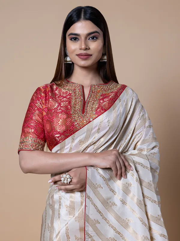 Off white silk saree with zari weaving