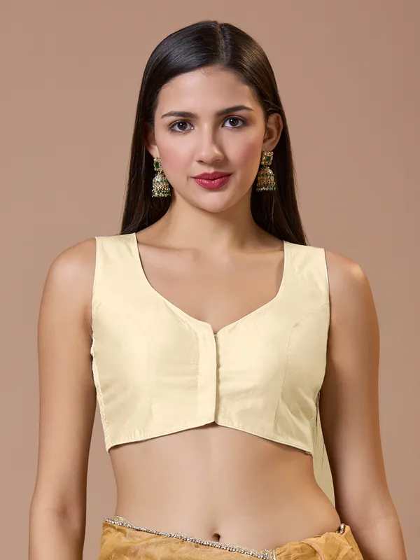 Off white silk sleeveless comfort fit ready made blouse