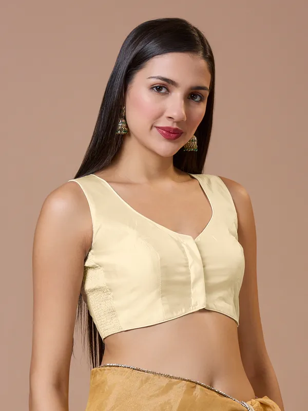 Off white silk sleeveless comfort fit ready made blouse