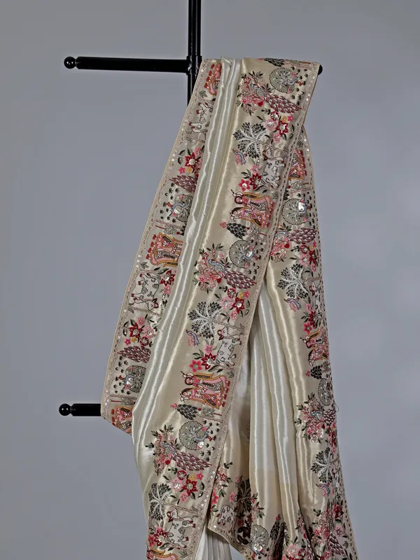 Off white tissue silk embroidery saree for wedding