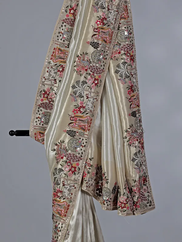 Off white tissue silk embroidery saree for wedding