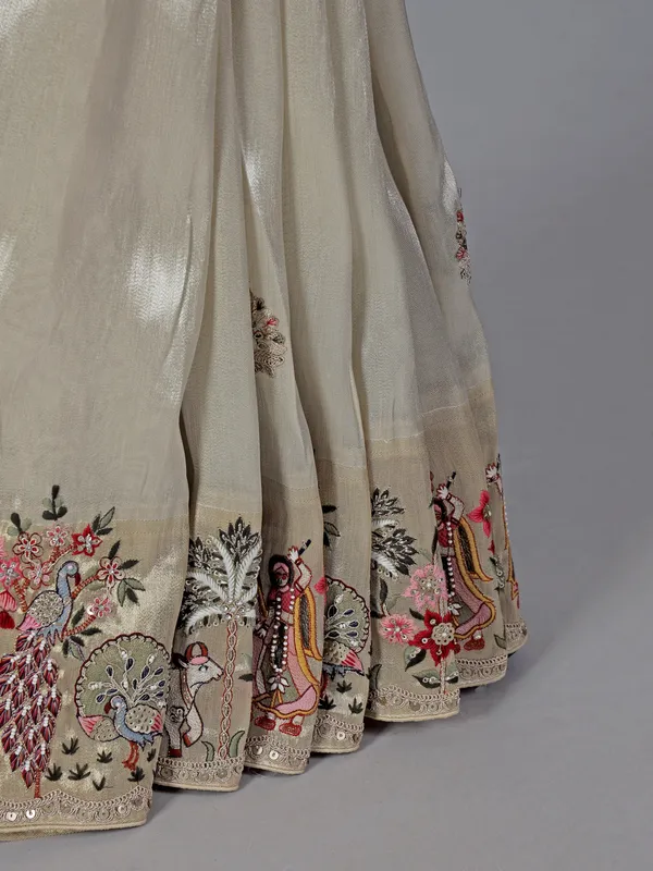 Off white tissue silk embroidery saree for wedding