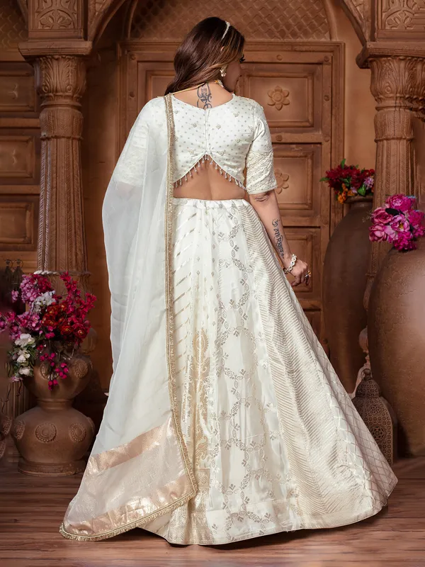 Off white tissue silk lehenga choli in traditional design