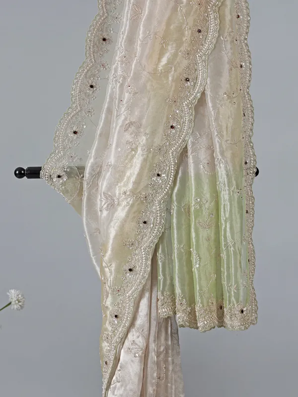 Off white tissue silk party wear saree
