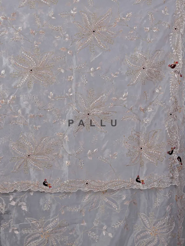 Off white tissue silk saree with embroidery work