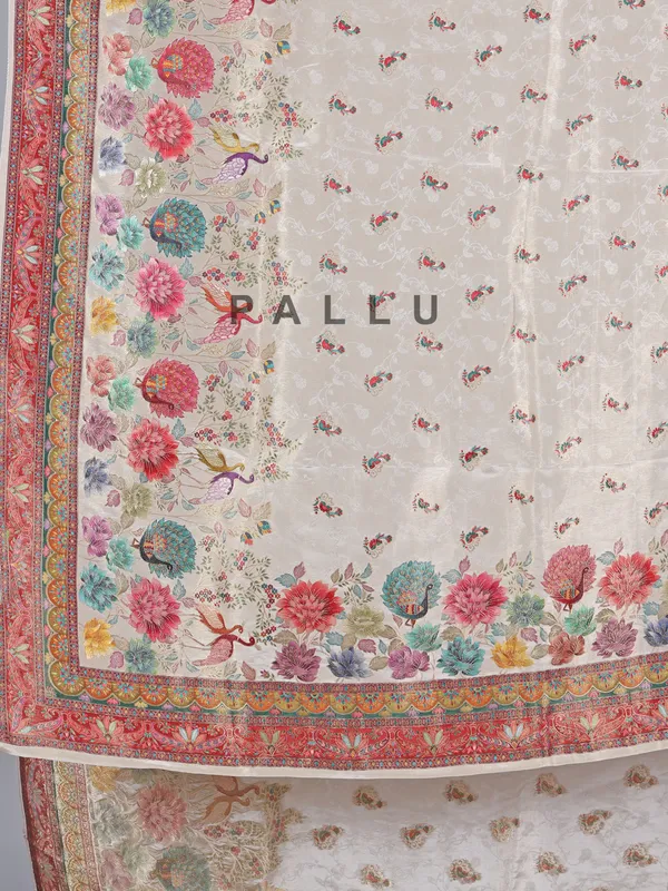 Off white tissue silk saree with floral accents