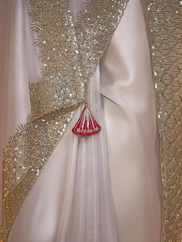 Off white tissue silk saree with resham work
